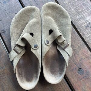 Men’s Birkenstock slip ons.